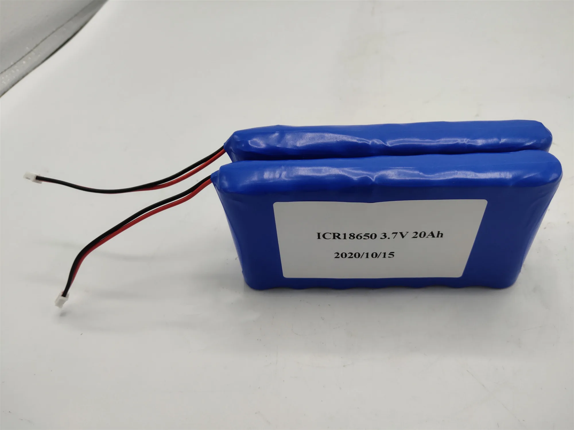 18650 lithium ion battery pack assembled with nickel strip and lead wires on a Sunder work bench